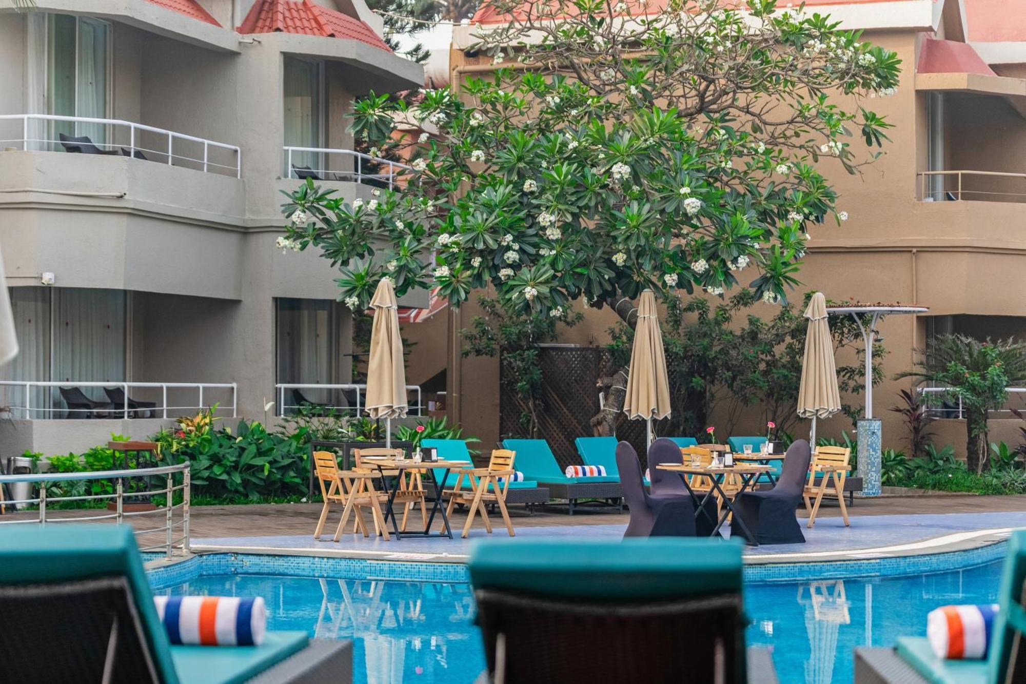 Whispering Palms Beach Resort Candolim Kültér fotó